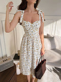 2026 European and American style women's floral print sundress with tie, low-cut V-neck, and slit, elegant and sophisticated