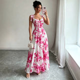 Popular pink floral print sundress from European and American cross-border e-commerce platforms. Slimming, flattering, and stylish A-line dress perfect for a vacation.