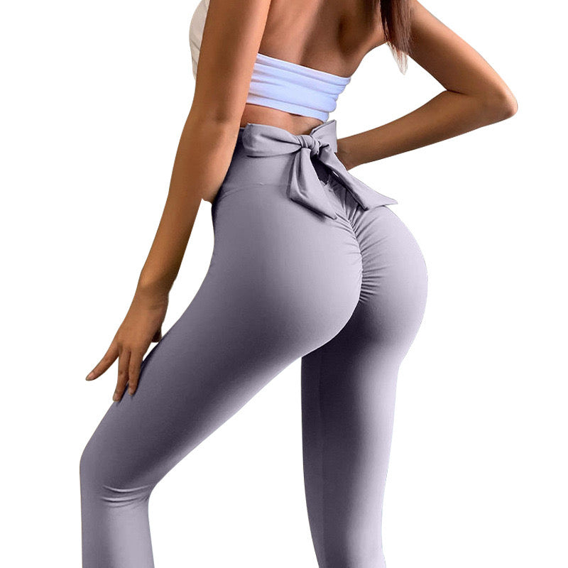 European and American seamless nude yoga pants women's bow peach hip-lifting sports fitness pants yoga clothes lulu yoga pants