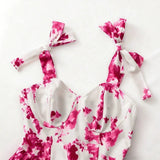 Popular pink floral print sundress from European and American cross-border e-commerce platforms. Slimming, flattering, and stylish A-line dress perfect for a vacation.