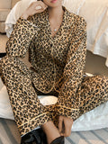 2-piece set of women's sexy and light luxury random printed leopard print long-sleeved cardigan and long pants set home clothes.